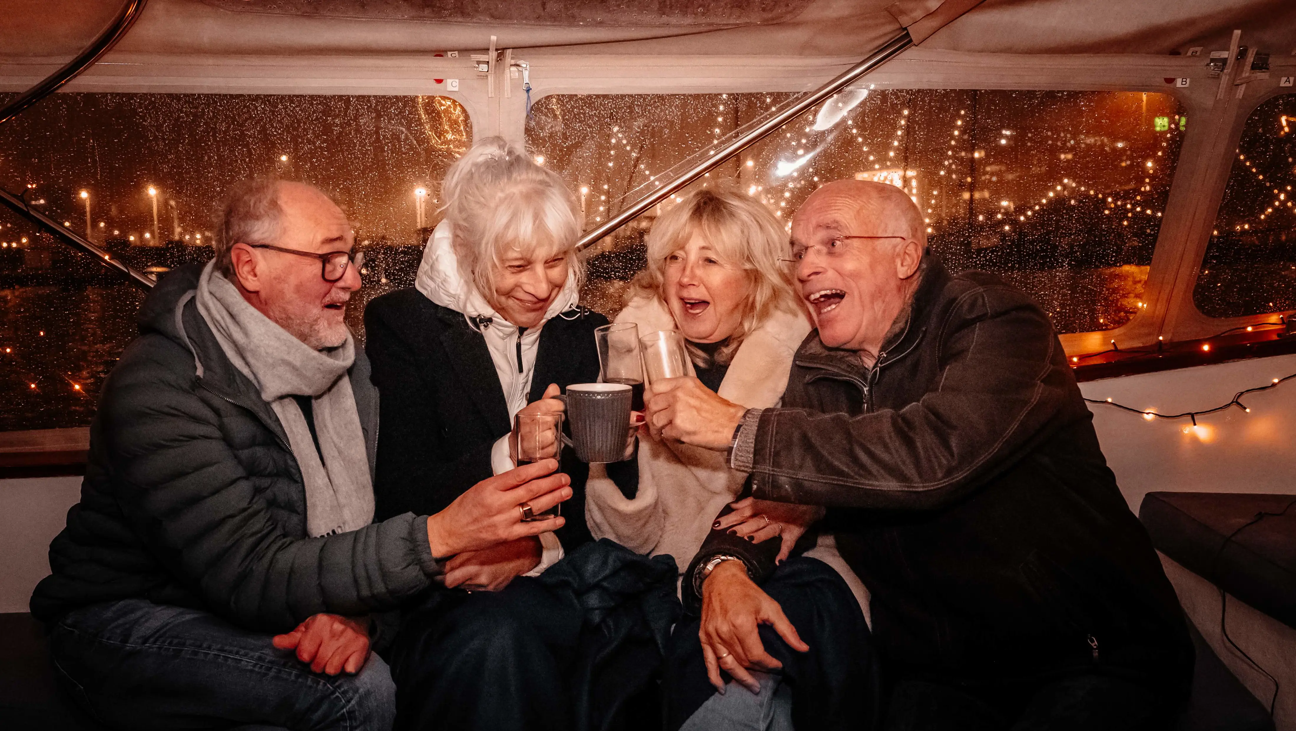 Cheers people drinks Amsterdam Light Festival